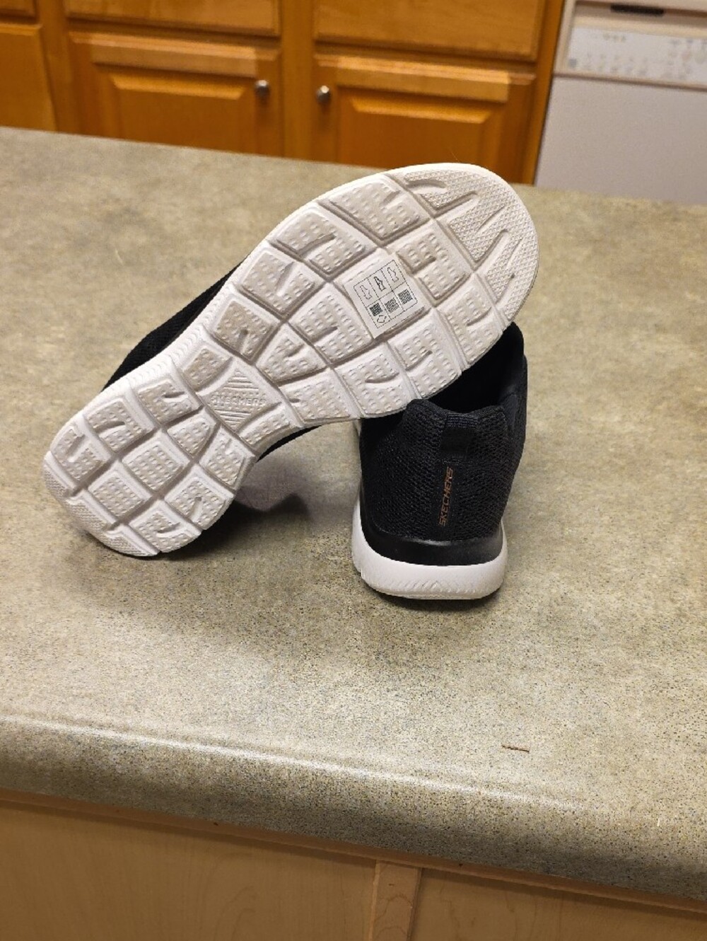 Skechers Women’s Black Slip-On Knit Sneakers with Gold Accents, Size 7 - Picture 2 of 9
